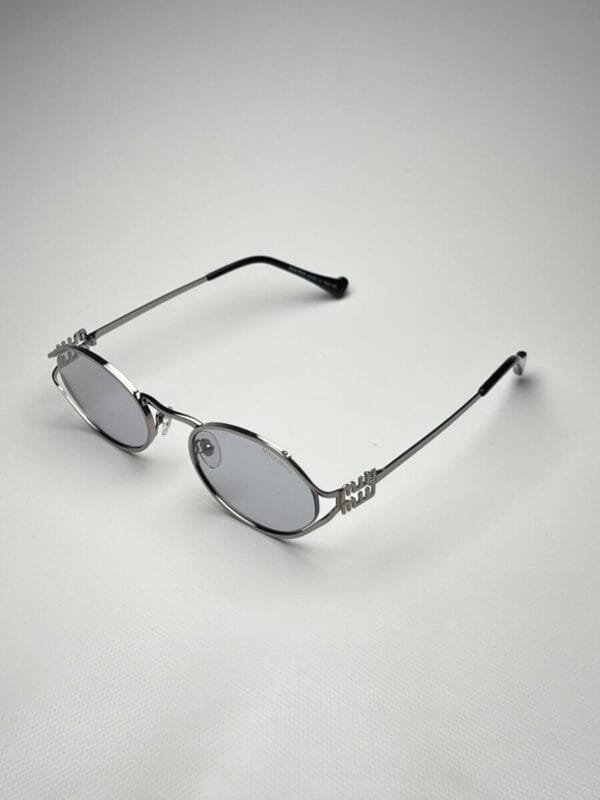 Miu-Miu Ovalada  Gris Transparente
